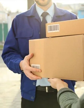 Delivery person handing over packages